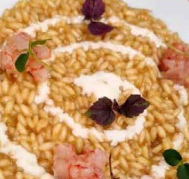 Risotto con calamari, gamberi, burrata e menta